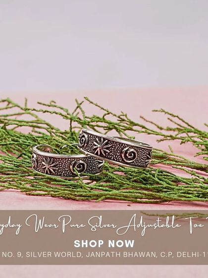 A pair of adjustable pure silver toe rings with a spiral and dotted pattern. These are a classic accessory in Indian tradition, designed for everyday comfort.