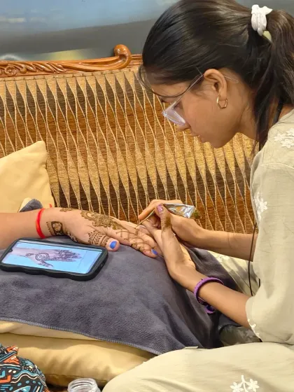 In the zone, creating a design for my client from the UK. Her phone is open with a reference picture, but we always add a personal touch.