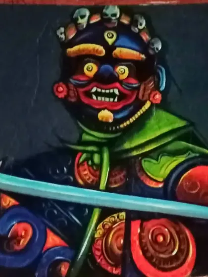 A striking painting of a fierce deity or guardian mask, characterized by its bold colors, intricate details, and powerful expression. This piece is inspired by traditional Himalayan and Tibetan art forms.