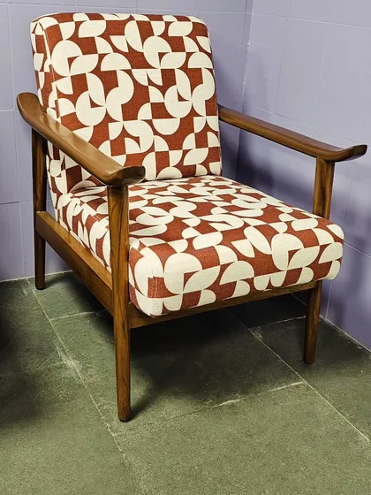 Another example of our custom work, this wooden armchair is upholstered in a striking geometric print fabric.