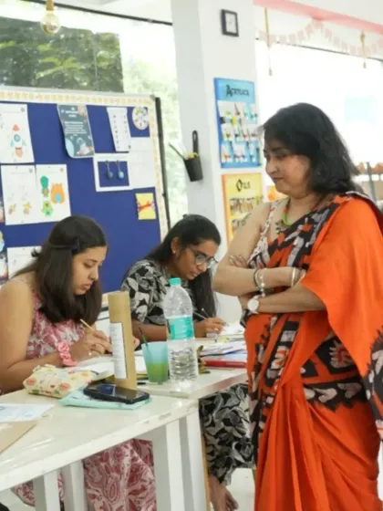 I believe in providing personal attention to every student. Here, I'm guiding a student through a drawing exercise in our Certificate in Fine Arts class.