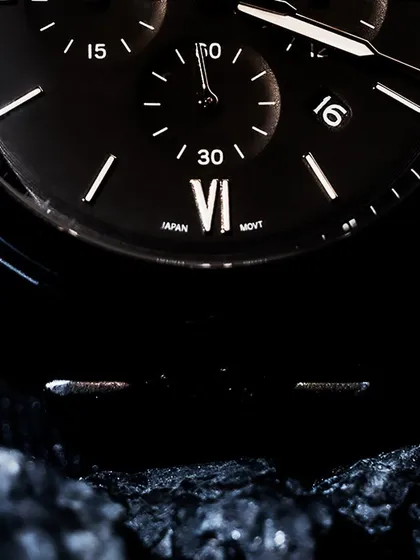 An extreme close-up or macro shot of the Fossil watch. The goal here was to focus entirely on the craftsmanship and precision of the dial. This type of detailed shot is crucial for luxury product marketing, as it communicates quality and builds trust with the customer.