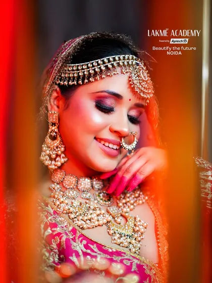 A happy bride is the most beautiful bride. This shot captures the joy and confidence that comes with a perfectly executed bridal makeup look, featuring a bright smile and sparkling eyes.