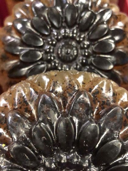 A close-up of my sunflower-molded soaps. The details in the mold hold the ground coffee and other exfoliants, making it as beautiful as it is effective.