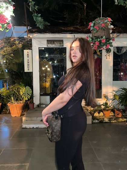 The client enjoying a night out with her new hair. The color looks stunning even in the evening light.