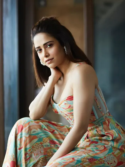 This printed bustier jumpsuit is a versatile piece I chose for Nushrratt Bharuccha's promotions. It's stylish, comfortable, and perfect for a long day of interviews and appearances.