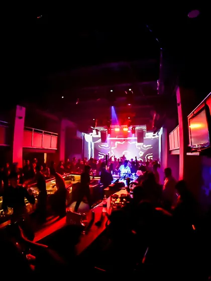 Another angle of a packed club night. The multi-level setup gives a great view of how the entire venue gets involved in the party.