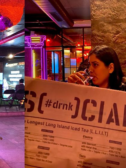 The menu at Social, a popular spot for cocktails and conversation, seen from the perspective of a patron.