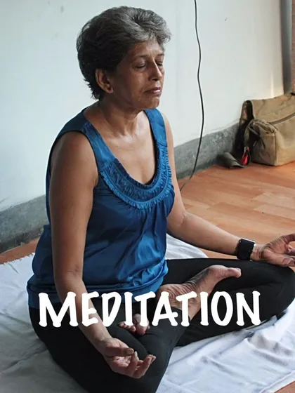 Meditation is the path to peace of mind. Here I am in a simple cross-legged position, showing that meditation is accessible to everyone.