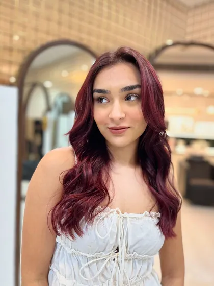 From another angle, you can see how the red wine colour catches the light. This is a perfect choice for someone looking for a bold yet sophisticated change.