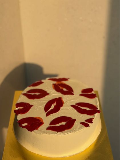 A still shot of our popular kiss-patterned cake, perfect for showing someone you care. The design is simple, modern, and very sweet.