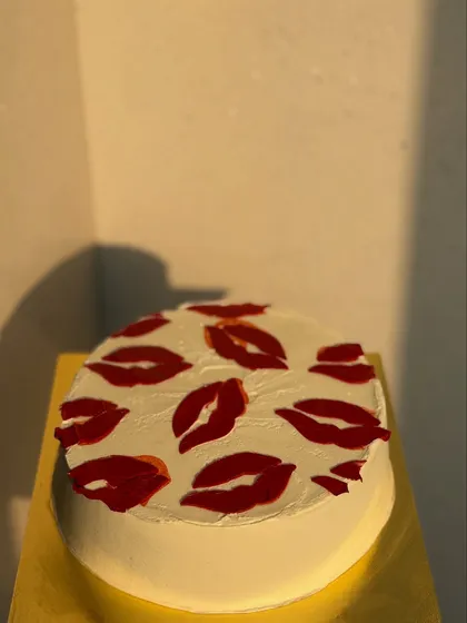 A still shot of our popular kiss-patterned cake, perfect for showing someone you care. The design is simple, modern, and very sweet.