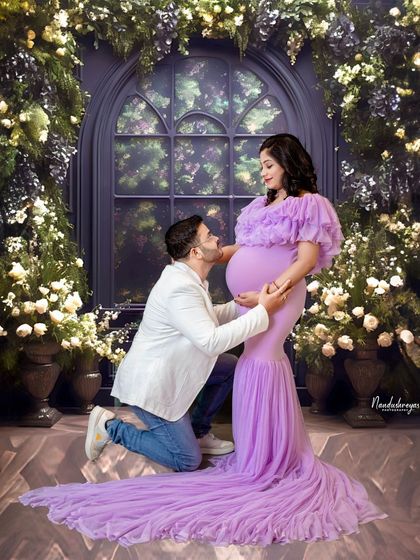 A duplicate of 45, this classic "adoring the bump" pose is a must-have for many couples. The fairytale setting makes it truly magical.