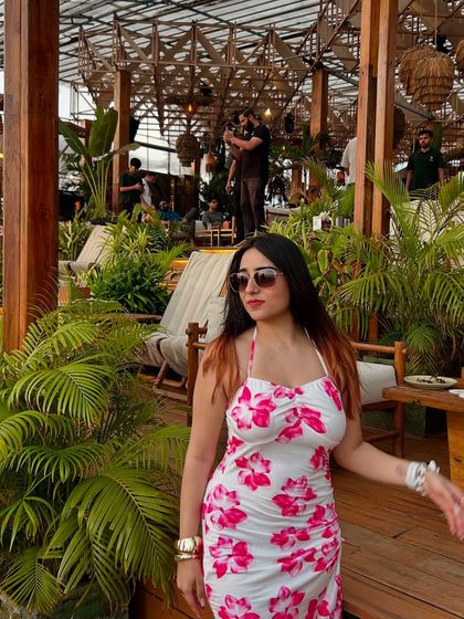 A stylish floral dress from NewMe, perfect for a brunch date. This look is fresh, summery, and effortlessly chic.