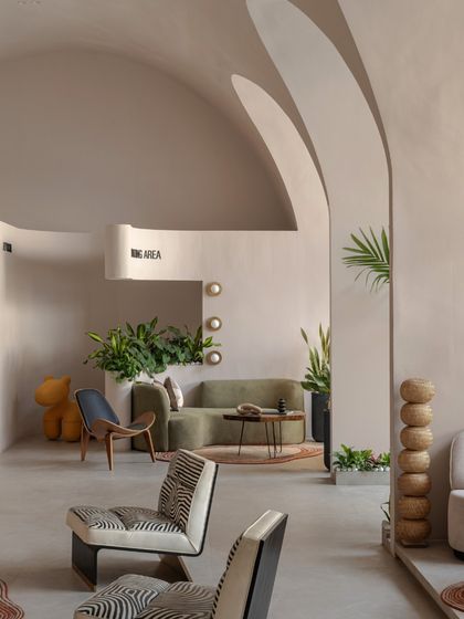 The "Vaultz's Up" Experience Centre, where five majestic vaults unite. The soaring ceilings and soft, luminous hues of the plaster finish create a sense of boundless grandeur and tranquility.