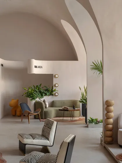 The view from the entrance, where five majestic vaults unite to form the soul of the space. The soaring ceilings and soft, luminous hues create a feeling of boundless, sophisticated calm.