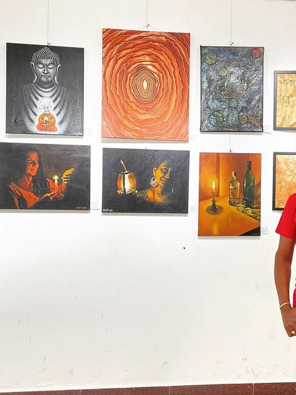 Standing with my displayed works at the Art.o.naut group exhibition.