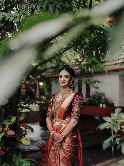 A bridal portrait is more than just a photo; it’s a story of grace and heritage. Here, I used the lush, natural surroundings to frame the bride, letting the soft light highlight the intricate details of her traditional attire and her serene elegance.