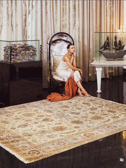 My work often extends to lifestyle and home decor. In this shoot for a luxury carpet brand, I styled the entire scene, from the model's attire to the room's ambiance, to create a narrative of quiet, sophisticated elegance.