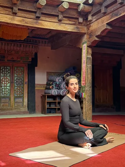 Seated and ready to begin practice in the beautiful, traditional yoga space at Nimmu House in Leh.