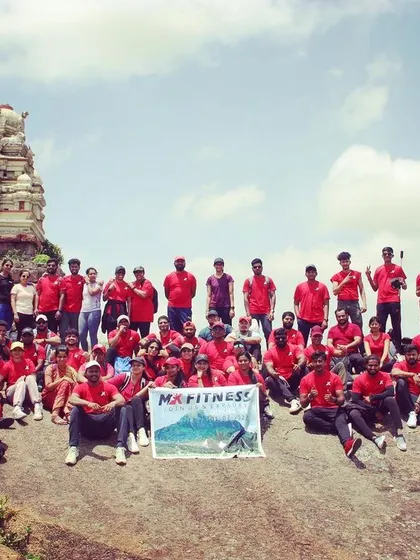 The power of community. Here's our amazing group after a successful trek at Shivagange. I lead treks for all group sizes, ensuring everyone feels supported and has an unforgettable experience.