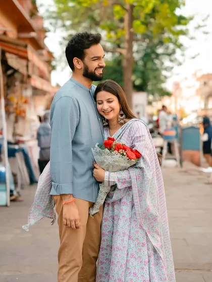 A sweet and affectionate hug, capturing a moment of comfort and happiness in a busy city setting.