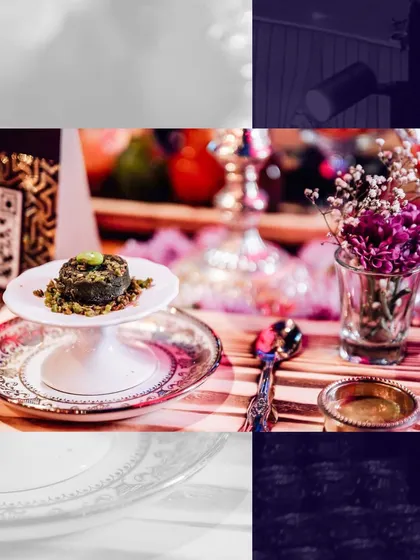 A single, perfectly crafted dessert bite, presented on an elegant pedestal. This is how we create a catering mood board, focusing on every detail to elevate your celebration.