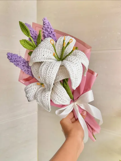 A beautiful custom bouquet featuring handcrafted crochet lilies and lavender. This shows the intricate detail and artistry we put into our floral arrangements, making them a perfect everlasting gift for special occasions like Valentine's or Galentine's Day.