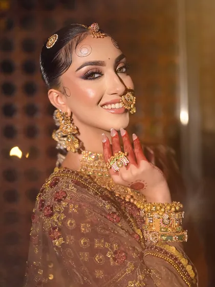 A happy, smiling bride. This shot captures the joy in her eyes, which are beautifully defined to make them sparkle.