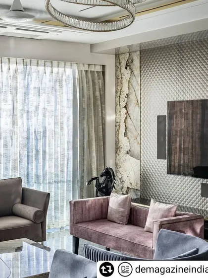 In this 4BHK luxury apartment in Lower Parel, we balanced a royal aesthetic with modern comfort. The living room features a mix of textures, from a quilted feature wall to Patagonia marble and bespoke furniture, all while maximizing the stunning views of the Mumbai skyline.