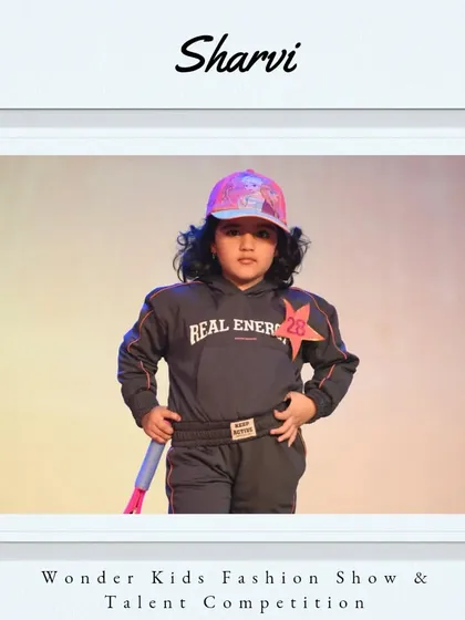 Welcome, Sharvi. Her sporty outfit and confident stance show she has "Real Energy".
