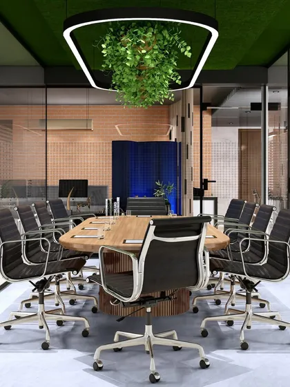 The conference room in our upcoming office project, featuring a large table and a unique hanging planter light fixture. The design creates a productive and inspiring workspace.
