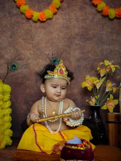 Our Little Krishna photoshoots are a favorite among parents. We use detailed costumes and vibrant, traditional backdrops to capture the playful and divine spirit of Bal Gopal.