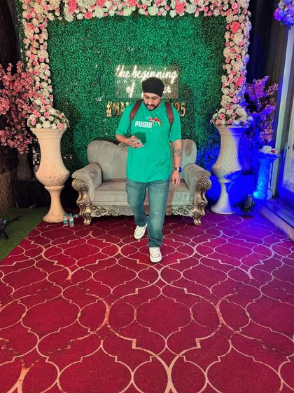 Checking my phone before the next set. Even on the busiest days, I'm focused on delivering the best experience.