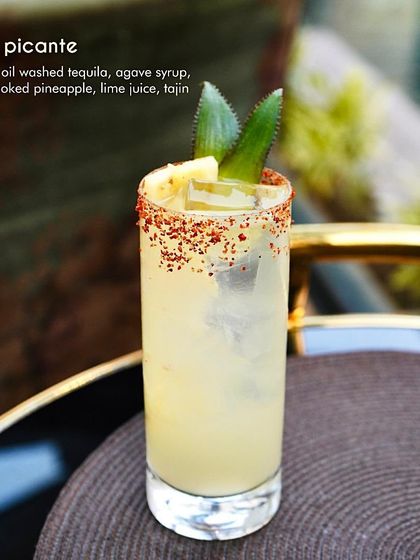 The Piña Picante is our tropical cocktail with a fiery edge. We use coconut oil washed tequila for a smooth texture, balanced with spicy smoked pineapple, agave, lime, and a tajin rim for a multi-layered experience.