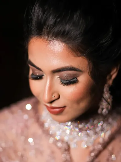A close-up on the shimmery bronzy brown smokey eyes we created for this engagement look. The subtle shimmer adds a touch of glamour without being overpowering.