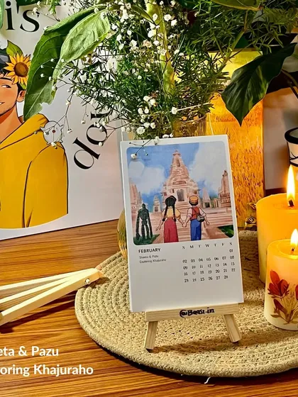 The February page, 'Sheeta & Pazu Exploring Khajuraho', set up on the easel. It shows how each month offers a new adventure.