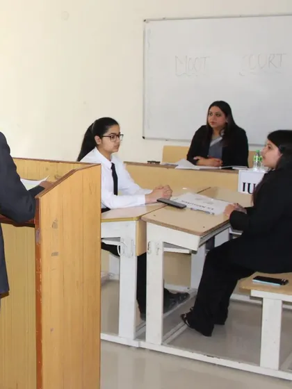 A student presenting her arguments before the judging panel. I make it a point to provide constructive feedback to help each participant grow, regardless of the competition's outcome.