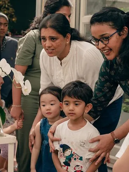I believe in taking learning outside the classroom. Here, we're on a nature walk to a local plant nursery, where the children got to see, touch, and smell different flowers and plants. These real-world experiences are invaluable for sparking a child's natural curiosity.