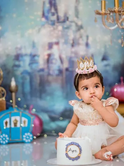 A first birthday is a huge milestone, and our Cinderella-themed cake smash is the perfect way to celebrate. We handle every detail, from the castle backdrop to the royal cake, so you can enjoy the magic.