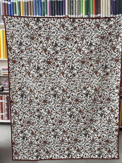 The floral backing fabric for the Dresden quilt.