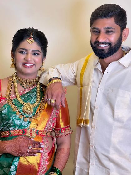 A beautiful moment between the happy couple. Her makeup is designed to look soft and glowing from every angle.