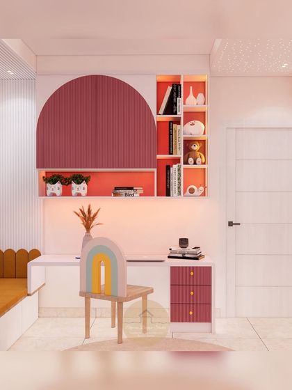 This whimsical kids' room features a custom study area with an arched cabinet in a bold magenta. The space includes a cozy reading nook with built-in seating, perfect for sparking creativity.