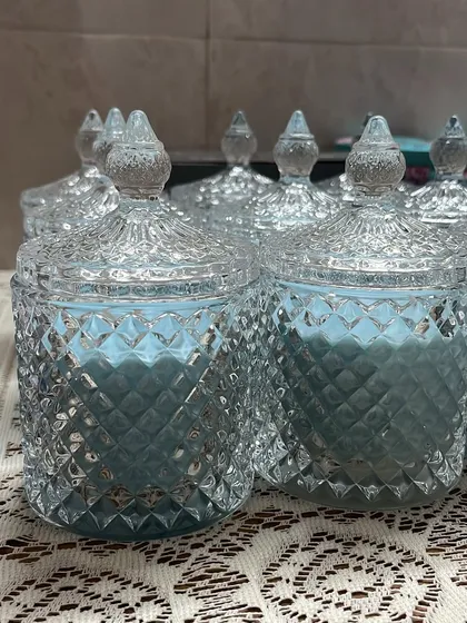 Our crystal candle is a stunning centerpiece. This one is in a lovely powder blue, made with 200gm of soy wax for a 50-hour burn time.