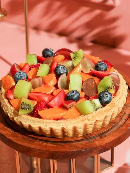Our fresh Fruit Tart, a vibrant and delicious way to start the new year on a sweet note.