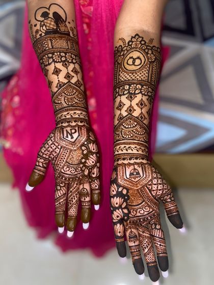 A romantic design featuring a silhouette of a couple on one arm and their initials, 'NP', on the other, along with wedding rings.