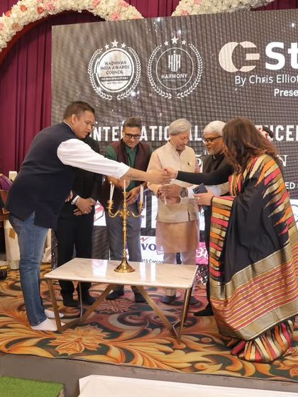 Another moment from the lamp lighting ceremony. It is a privilege to share the stage with such distinguished guests and contribute to the positive energy of the event.