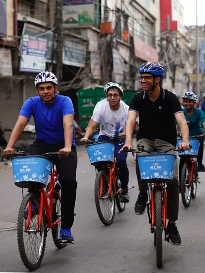 A group of friends enjoying the ride through the narrow lanes of Old Delhi. The shared experience of navigating the city together is always a highlight.
