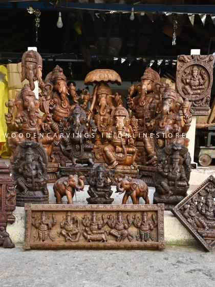 A collection of our Lord Ganapathi sculptures and panels displayed in our workshop. This image showcases the variety of sizes and styles we offer, from small wall mounts to large statues, especially for Ganesh Chaturthi.