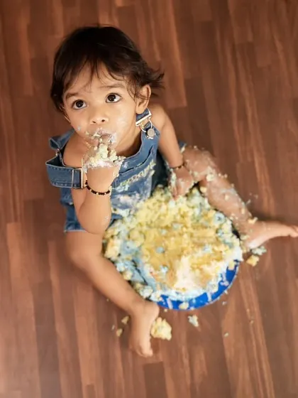 There's nothing more fun than a first birthday cake smash. I capture these messy, joyful milestones from every angle, ensuring you remember this sweet moment forever.